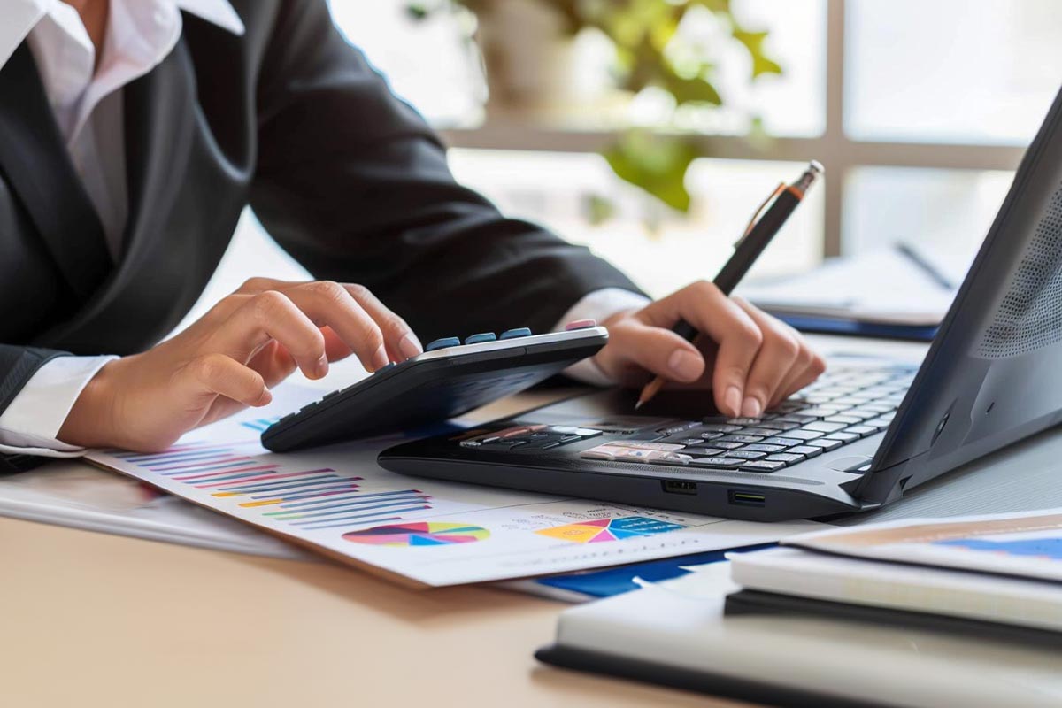 Image of LP BOOKKEEPING sevices Cork and Ireland showing a close up of a woman carrying out accountancy services at her desk